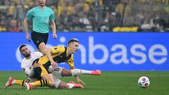 Stuttgart's German forward #26 Deniz Undav (L) and Dortmund's German defender #04 Nico Schlotterbeck vie for the ball during the German first division Bundesliga football match between Borussia Dortmund and VfB Stuttgart in Dortmund, western Germany on April 6, 2024. (Photo by INA FASSBENDER / AFP)