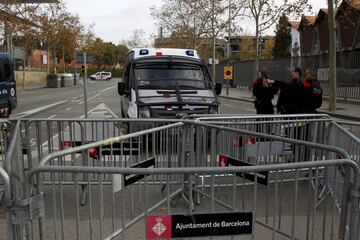 Mossos d'Esquadra, the Catalonia regional police force, keeping a watchful eye as the Barça team bus makes its way to the hotel.