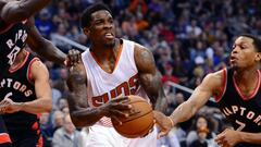 Dec 29, 2016; Phoenix, AZ, USA;  Phoenix Suns guard Eric Bledsoe (2) is defended by Toronto Raptors guard Kyle Lowry (7) in the second half of the NBA game at Talking Stick Resort Arena. The Suns won 99-91. Mandatory Credit: Jennifer Stewart-USA TODAY Sports