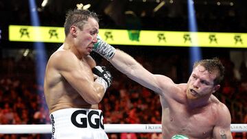 LAS VEGAS, NEVADA - SEPTEMBER 17: Canelo Alvarez (red trunks) lands a punch against Gennadiy Golovkin (white trunks) in the fight for the Super Middleweight Title at T-Mobile Arena on September 17, 2022 in Las Vegas, Nevada.   Sarah Stier/Getty Images/AFP