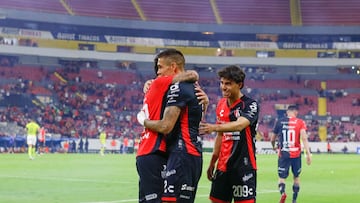 Diego Gonzalez celebrates his goal 2-2 with Uros Durdevic of Atlas during the 7th round match between Atlas and Puebla as part of the Liga BBVA MX, Torneo Clausura 2025 at Jalisco Stadium, on February 15, 2025 in Guadalajara, Jalisco Mexico.