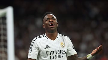 Real Madrid's Brazilian forward #07 Vinicius Junior reacts during the UEFA Champions League, league phase football match between Real Madrid CF and FC Salzburg at the Santiago Bernabeu stadium in Madrid on January 22, 2025. (Photo by Pierre-Philippe MARCOU / AFP)