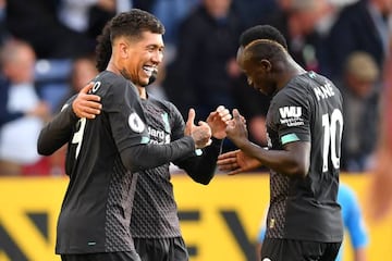 Roberto Firmino celebrates with Liverpool team mates