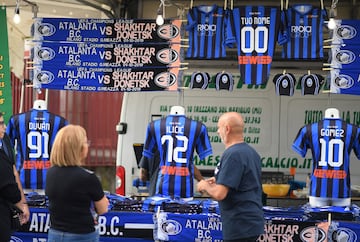 Soccer Football - Group C - Atalanta v Shakhtar Donetsk - San Siro, Milan, Italy - October 1, 2019  General view of merchandise for sale at a vendor outside the stadium before the match  