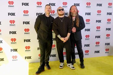 Barry Kerch, Brent Smith y Zach Myers componentes de la banda de rock, Shinedown.