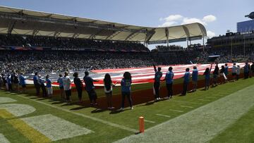 CARSON, CA - SEPTEMBER 08: A large American flag cover the field during pre-game festivities before the start of the Los Angeles Chargers season opens against Indianapolis Colts at Dignity Health Sports Park on September 8, 2019 in Carson, California. Kevork Djansezian/Getty Images/AFP
== FOR NEWSPAPERS, INTERNET, TELCOS & TELEVISION USE ONLY ==