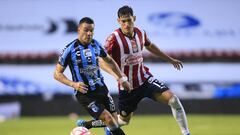   (L-R), Pablo Barrera of Queretaro and Jesus Orozco of Guadalajara during the game Queretaro vs Guadalajara corresponding Round 05 the Torneo Apertura 2022 of the Liga BBVA MX at La Corregidora Stadium, on July 27, 2022.

<br><br>

(I-D), Pablo Barrera de Queretaro y Jesus Orozco de Guadalajara  durante el partido Queretaro vs Guadalajara, correspondiente a la Jornada 05 del Torneo Apertura 2022 de la Liga BBVA MX en el Estadio La Corregidora, el 27 de julio de 2022.