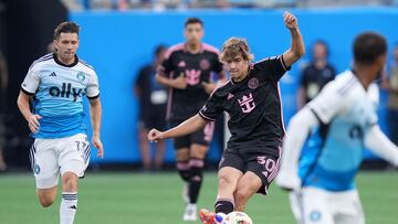 Jul 3, 2024; Charlotte, North Carolina, USA; Inter Miami CF midfielder Benjamin Cremaschi (30) controls the ball against Charlotte FC midfielder Brandt Bronico (13) in the first half at Bank of America Stadium. Mandatory Credit: Jim Dedmon-USA TODAY Sports