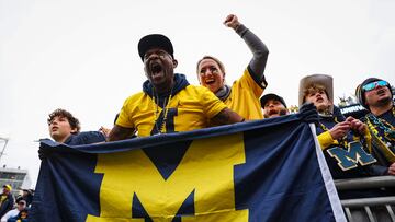 STATE COLLEGE, PA - NOVEMBER 11: Michigan Wolverines fans celebrate after the game between the Penn State Nittany Lions and the Michigan Wolverines at Beaver Stadium on November 11, 2023 in State College, Pennsylvania.   Scott Taetsch/Getty Images/AFP (Photo by Scott Taetsch / GETTY IMAGES NORTH AMERICA / Getty Images via AFP)