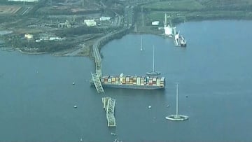 An aerial view of the Dali cargo vessel which crashed into the Francis Scott Key Bridge causing it to collapse in Baltimore, Maryland, U.S., March 26, 2024, in this still image taken from a video.   ABC AFFILIATE WJLA via REUTERS.  NO RESALES. NO ARCHIVES. MANDATORY CREDIT. THIS IMAGE HAS BEEN SUPPLIED BY A THIRD PARTY