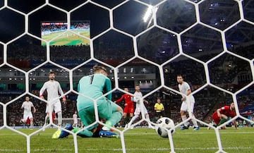 Cristiano Ronaldo's shot squirms through David de Gea's fingers in Sochi.