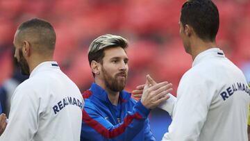 Cristiano Ronaldo y Leo Messi durante un Cl&aacute;sico de la pasada temporada.