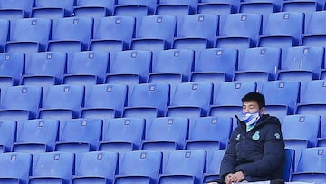 BARCELONA, SPAIN - FEBRUARY 20: Wu Lei of RCD Espanyol follows the match in the bench during the Liga Smartbank match betwen RCD Espanyol de Barcelona and CE Sabadell at RCDE Stadium on February 20, 2021 in Barcelona, Spain. Sporting stadiums around Spain