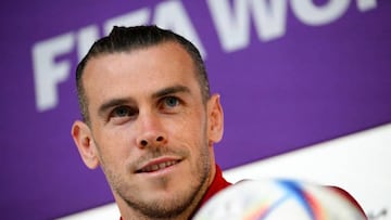 Wales' forward Gareth Bale addresses a press conference at the Qatar National Convention Center (QNCC) in Doha on November 28, 2022, on the eve of the Qatar 2022 World Cup football match between Wales and England. (Photo by Nicolas TUCAT / AFP) (Photo by NICOLAS TUCAT/AFP via Getty Images)