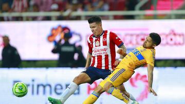 (L-R), Pavel Perez of Guadalajara and Javier Aquino of Tigres during the game Guadalajara vs Tigres UANL, corresponding to second leg match of great final of the Torneo Clausura 2023 of the Liga BBVA MX, at Akron Stadium, on May 28, 2023.

<br><br>

(I-D), Pavel Perez de Guadalajara y Javier Aquino de Tigres durante el partido Guadalajara vs Tigres UANL, Correspondiente al partido de Vuelta de la Gran final del Torneo Clausura 2023 de la Liga BBVA MX, en el Estadio Akron, el 28 de Mayo de 2023.