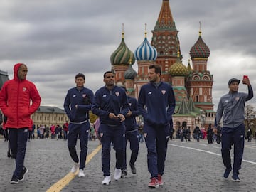 Sevilla players on Red Square in Moscow with Saint Basil's Cathedral in the background.