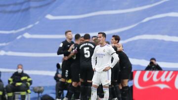 MADRID, SPAIN - JANUARY 23: Lucas Vazquez of Real Madrid CF reacts as Elche players celebrate their opening goal during the LaLiga Santander match between Real Madrid CF and Elche CF at Estadio Santiago Bernabeu on January 23, 2022 in Madrid, Spain. (Phot