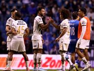 Soccer Football - Liga MX - Cruz Azul v Pumas UNAM - Estadio Cuauhtemoc, Puebla, Mexico - November 8, 2025 Pumas UNAM's Adalberto Carrasquilla and Nathan Silva celebrate after the match REUTERS/Henry Romero