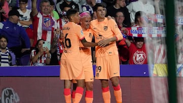 Nahuel Molina, Griezmann y Morata celebran un gol del Atlético.