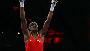 Panama's Atheyna Bibeichi Bylon reacts after beating Poland's Elzbieta Wojcik (Blue) in the women's 75kg quarter-final boxing match during the Paris 2024 Olympic Games at the North Paris Arena, in Villepinte on August 4, 2024. (Photo by MOHD RASFAN / AFP)