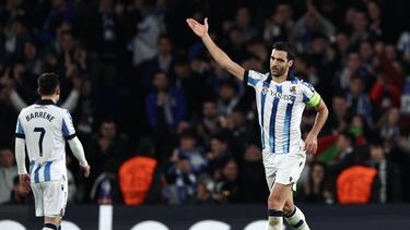 Real Sociedad's Spanish midfielder #08 Mikel Merino celebrates scoring a goal during the UEFA Champions League last 16 second leg football match between Real Sociedad and Paris Saint-Germain (PSG) at the Anoeta stadium in San Sebastian on March 5, 2024. (Photo by FRANCK FIFE / AFP)