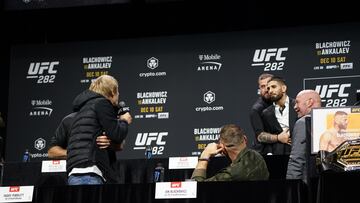LAS VEGAS, NV - DECEMBER 8: Ilia Topuria and Paddy Pimblett held back by security during a shouting match at the UFC 282 pre-fight press conference on December 8, 2022, at the MGM Garden Grand Arena in Las Vegas, NV. (Photo by Amy Kaplan/Icon Sportswire via Getty Images)