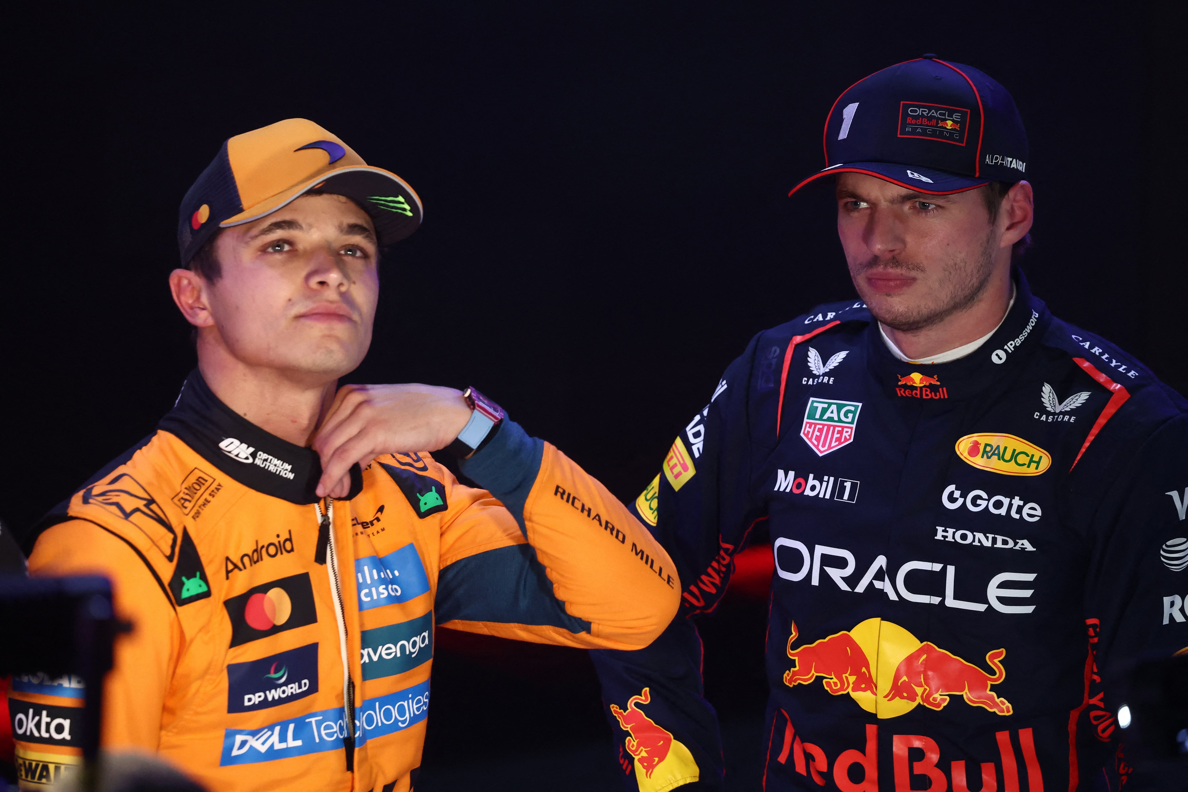Formula One F1 - Qatar Grand Prix - Lusail International Circuit, Lusail, Qatar - November 29, 2025 McLaren's Lando Norris after qualifying in second place with third placed Red Bull's Max Verstappen REUTERS/Jakub Porzycki