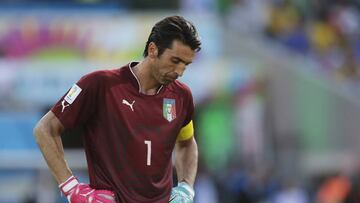 FILE - In this June 24, 2014 file photo, Italy&#039;s goalkeeper Gianluigi Buffon stands on the pitch following Uruguay&#039;s 1-0 victory over Italy during the group D World Cup soccer match at the Arena das Dunas in Natal, Brazil. The best players in the world go elsewhere. The best coaches in Italy emigrate. The stadiums around the country are falling apart. The lingering problems affecting Italy&#039;s domestic league might just be the reason for the country&#039;s failure to qualify for next year&#039;s World Cup. (AP Photo/Petr David Josek, file)