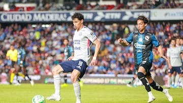 Angel Marquez (L) of Cruz Azul fights for the ball with Daniel Parra (R) of Queretaro during the 16th round match between Queretaro and Cruz Azul as part of the Liga BBVA MX Varonil, Torneo Clausura 2026 at La Corregidora Stadium, on April 21, 2026 in Santiago de Queretaro, Mexico.