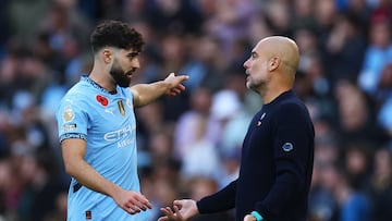 Soccer Football - Premier League - Manchester City v Southampton - Etihad Stadium, Manchester, Britain - October 26, 2024 Manchester City manager Pep Guardiola gives instructions to Manchester City's Josko Gvardiol REUTERS/Molly Darlington EDITORIAL USE ONLY. NO USE WITH UNAUTHORIZED AUDIO, VIDEO, DATA, FIXTURE LISTS, CLUB/LEAGUE LOGOS OR 'LIVE' SERVICES. ONLINE IN-MATCH USE LIMITED TO 120 IMAGES, NO VIDEO EMULATION. NO USE IN BETTING, GAMES OR SINGLE CLUB/LEAGUE/PLAYER PUBLICATIONS. PLEASE CONTACT YOUR ACCOUNT REPRESENTATIVE FOR FURTHER DETAILS..