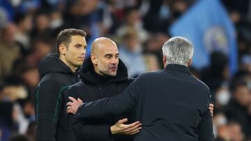 MANCHESTER, ENGLAND - APRIL 26: Pep Guardiola, Manager of Manchester City interacts with Carlo Ancelotti, Head Coach of Real Madrid after the UEFA Champions League Semi Final Leg One match between Manchester City and Real Madrid at Etihad Stadium on April