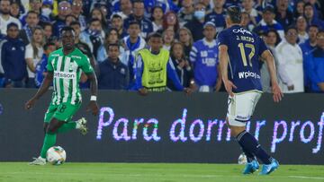 Jorge Arias of Millonarios and Marino Hinestroza of Atletico Nacional fight for the ball during the match on the third date of the semifinal quadrangulars of Group A for the BetPlay DIMAYOR II 2024 League at the Nemesio Camacho El Campin Stadium in Bogota, Colombia, on november 29, 2024. (Photo by Daniel Garzon Herazo/NurPhoto via Getty Images)
