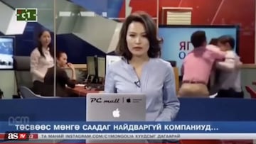 Mongolian news reporter has no idea what's going on behind her