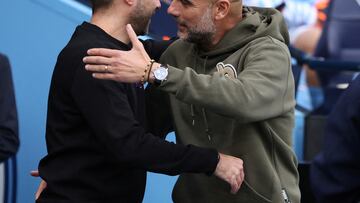 FILE PHOTO: Soccer Football - Premier League - Manchester City v Brighton & Hove Albion - Etihad Stadium, Manchester, Britain - October 22, 2022 Brighton & Hove Albion manager Roberto De Zerbi and Manchester City manager Pep Guardiola before the match REUTERS/Phil Noble EDITORIAL USE ONLY. No use with unauthorized audio, video, data, fixture lists, club/league logos or 'live' services. Online in-match use limited to 75 images, no video emulation. No use in betting, games or single club /league/player publications.  Please contact your account representative for further details./File Photo