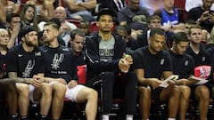 LAS VEGAS, NEVADA - JULY 11: Victor Wembanyama (C) #1 of the San Antonio Spurs looks on from the bench in the first half of a 2023 NBA Summer League game against the Washington Wizards at the Thomas & Mack Center on July 11, 2023 in Las Vegas, Nevada. NOTE TO USER: User expressly acknowledges and agrees that, by downloading and or using this photograph, User is consenting to the terms and conditions of the Getty Images License Agreement.   Ethan Miller/Getty Images/AFP (Photo by Ethan Miller / GETTY IMAGES NORTH AMERICA / Getty Images via AFP)