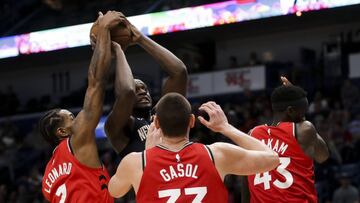 Mar 8, 2019; New Orleans, LA, USA; Toronto Raptors forward Kawhi Leonard (2) blocks a shot by New Orleans Pelicans center Julius Randle (30) during the second half at the Smoothie King Center. Mandatory Credit: Derick E. Hingle-USA TODAY Sports