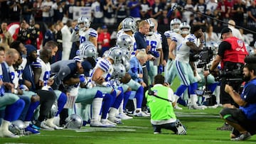 Sep 25, 2017; Glendale, AZ, USA; The Dallas Cowboys players, coaches staff and owner Jerry Jones take a knee prior to the National Anthem before the game against the Arizona Cardinals at University of Phoenix Stadium. Mandatory Credit: Matt Kartozian-USA TODAY Sports