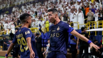 Nassr's Portuguese forward #07 Cristiano Ronaldo (R) celebrates his second goal during the Saudi Pro League football match between Al-Nassr and Al-Shabab in Riyadh's Al-Awal Park Stadium on August 29, 2023. (Photo by Fayez Nureldine / AFP)