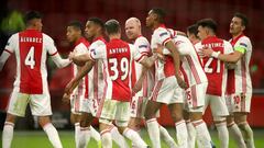 AMSTERDAM, NETHERLANDS - MARCH 11: Davy Klaassen of Ajax  celebrates with Antony and teammates after scoring their team&#039;s first goal during the UEFA Europa League Round of 16 First Leg match between Ajax and BSC Young Boys at Johan Cruijff Arena on M