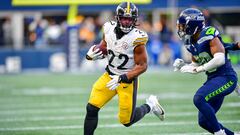 SEATTLE, WASHINGTON - DECEMBER 31: Najee Harris #22 of the Pittsburgh Steelers runs with the ball during the fourth quarter of a game against the Seattle Seahawks at Lumen Field on December 31, 2023 in Seattle, Washington.   Jane Gershovich/Getty Images/AFP (Photo by Jane Gershovich / GETTY IMAGES NORTH AMERICA / Getty Images via AFP)