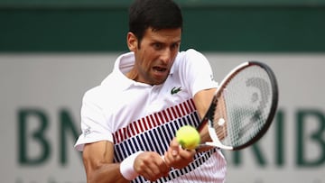 Djokovic sinks Sousa in three