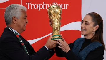 Brazilian former soccer player Jose Roberto Gama de Oliveira 'Bebeto' and Mexico's President Claudia Sheinbaum hold the FIFA World Cup trophy during her morning press conference at the National Palace, in Mexico City, Mexico, March 3, 2026. REUTERS/Stringer TPX IMAGES OF THE DAY