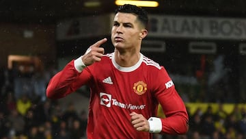 Manchester United&#039;s Portuguese striker Cristiano Ronaldo celebrates after scoring the opening goal from the penalty spot during the English Premier League football match between Norwich City and Manchester United at Carrow Road Stadium in Norwich, ea