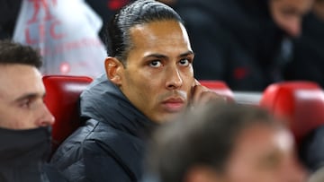 Soccer Football - Premier League - Liverpool v Everton - Anfield, Liverpool, Britain - February 13, 2023 Liverpool's Virgil van Dijk on the substitutes bench before the match REUTERS/Carl Recine EDITORIAL USE ONLY. No use with unauthorized audio, video, data, fixture lists, club/league logos or 'live' services. Online in-match use limited to 75 images, no video emulation. No use in betting, games or single club /league/player publications. Please contact your account representative for further details.