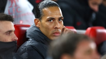 Soccer Football - Premier League - Liverpool v Everton - Anfield, Liverpool, Britain - February 13, 2023 Liverpool's Virgil van Dijk on the substitutes bench before the match REUTERS/Carl Recine EDITORIAL USE ONLY. No use with unauthorized audio, video, data, fixture lists, club/league logos or 'live' services. Online in-match use limited to 75 images, no video emulation. No use in betting, games or single club /league/player publications.  Please contact your account representative for further details.