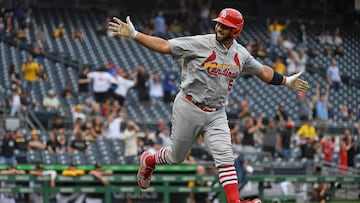 PITTSBURGH, PA - SEPTEMBER 11: Albert Pujols #5 of the St. Louis Cardinals reacts as he rounds the bases after hitting a two-run home run in the ninth inning during the game against the Pittsburgh Pirates at PNC Park on September 11, 2022 in Pittsburgh, Pennsylvania. The home run was the 697th of Pujols career, moving him to 4th place all time in MLB home runs.   Justin Berl/Getty Images/AFP