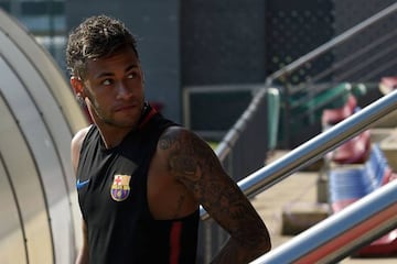 Neymar arrives for a training session at Barcelona's training ground on Monday.