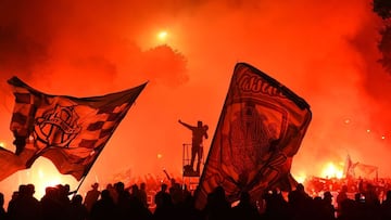 (FILES) In this file photo taken on November 10, 2019 Olympique de Marseille (OM) supporters light flares and wave flags to celebrate the club's 120th birthday prior to the French L1 football match between Olympique de Marseille (OM) and Olympique Ly