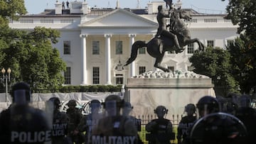 DC National Guard military police officers stand guard as demonstrators rally near the White House against the death in Minneapolis police custody of George Floyd, in Washington, D.C., U.S., June 1, 2020. REUTERS/Jonathan Ernst