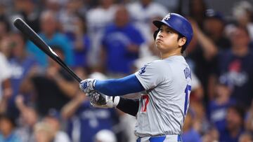 MIAMI, FLORIDA - SEPTEMBER 19: Shohei Ohtani #17 of the Los Angeles Dodgers hits a two-run home run, his 50th of the season, becoming the first player with a 50/50 season in MLB history, during the seventh inning against the Miami Marlins at loanDepot park on September 19, 2024 in Miami, Florida. (Photo by Megan Briggs/Getty Images)